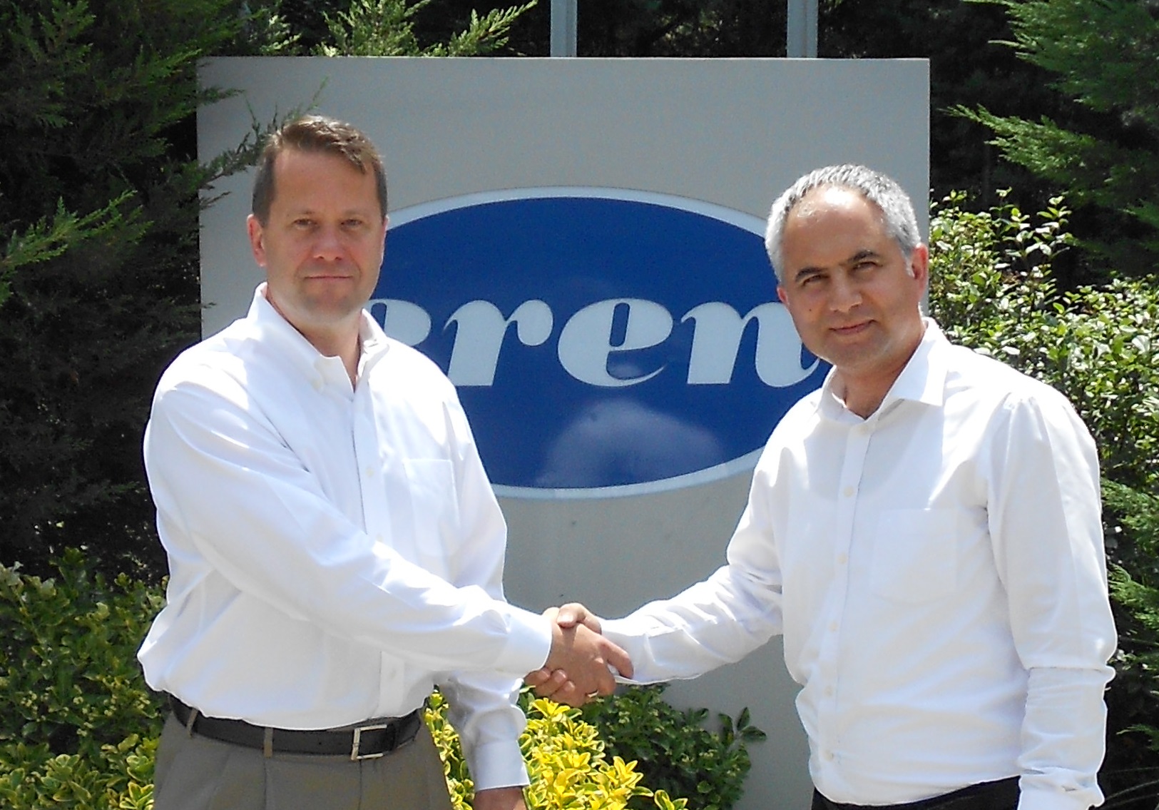 Shaking hands after concluding deal for new Turkey plant