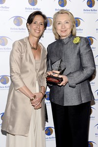 HKI President and CEO Kathy Spahn with Former Secretary of State Hillary Clinton at the Spirit of Helen Keller Gala May 22, 2013 at Christie's, New York City