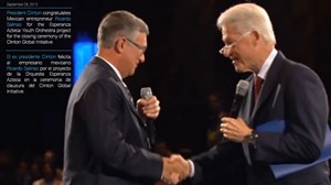 President Bill Clinton congratulates Ricardo Salinas