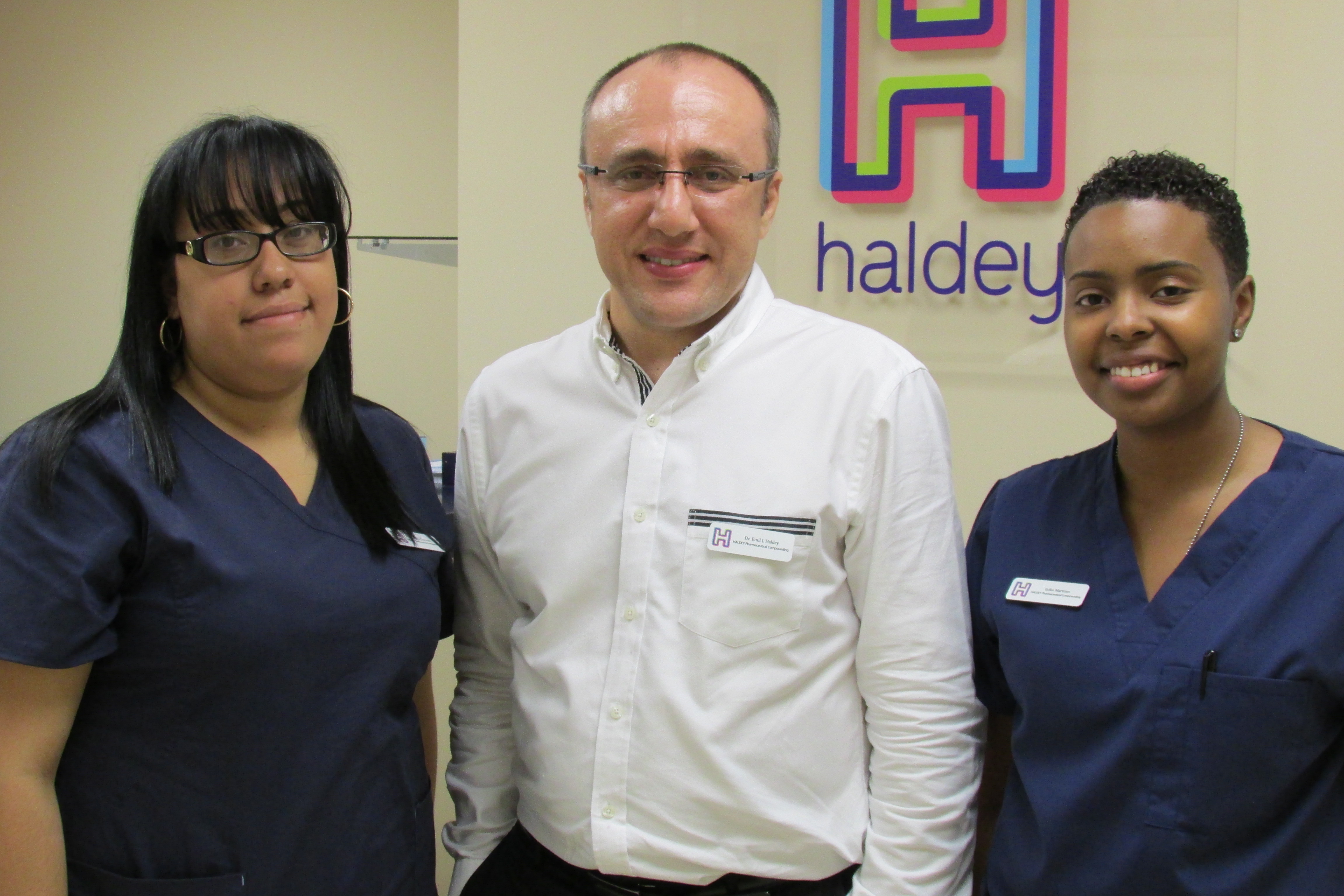 Dr. Emil Haldey with associates 