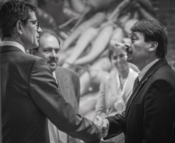 LogMeIn CEO Michael Simon greets Hungarian President Ader