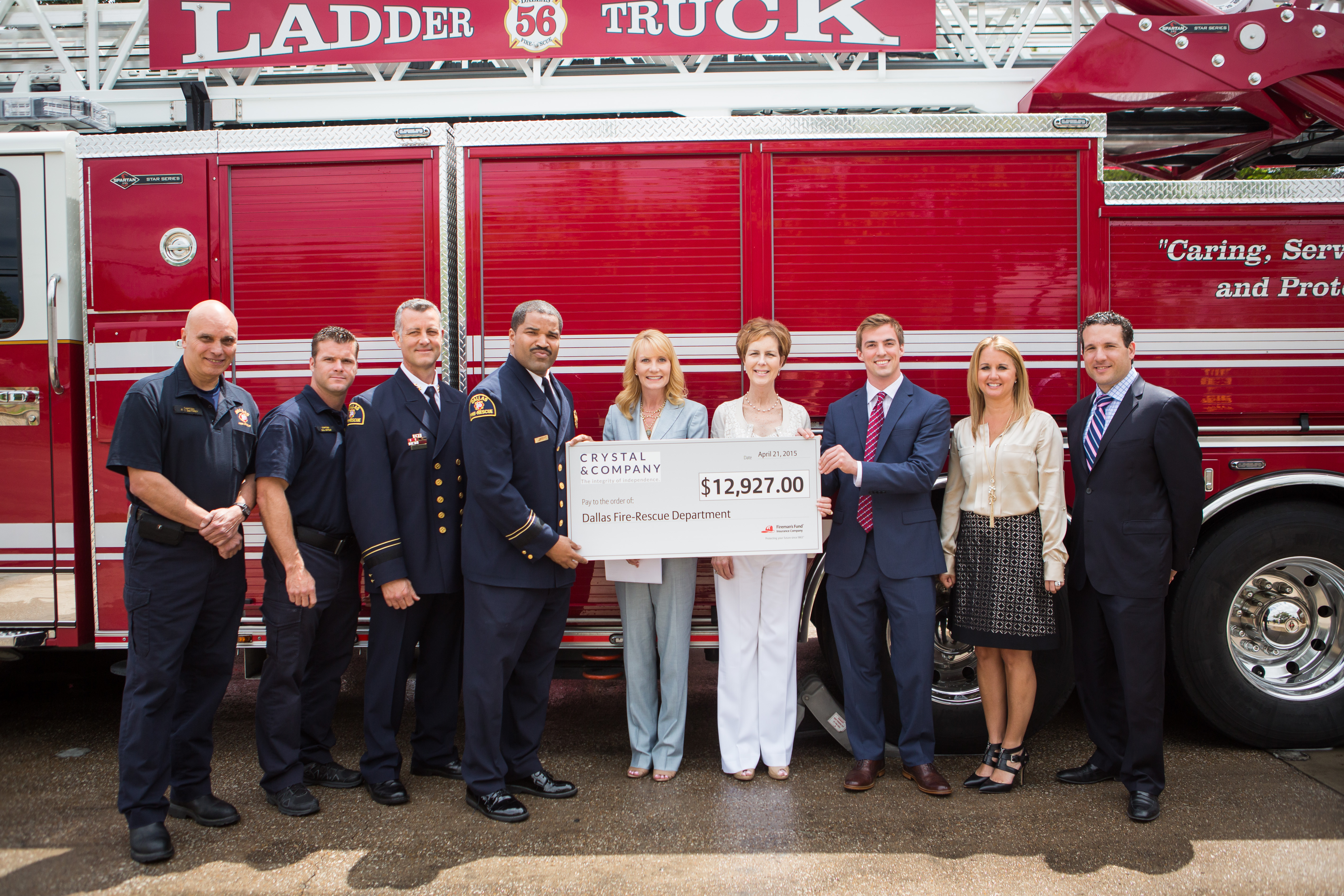 Crystal & Company presents Dallas Fire-Rescue Department with grant check