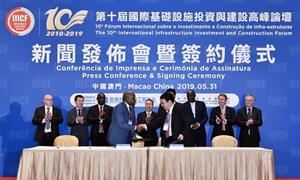 Figure 1: Segun Lawson, CEO and President of Thor Explorations and Jianyi Wei, General Manager of the 4th International Engineering Department, Norinco International, exchange signed contracts at the signing ceremony held in Macao, China.